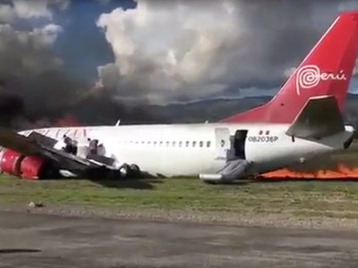  Lửa khói bốc cao từ nơi máy bay bị cháy - Ảnh chụp từ clip