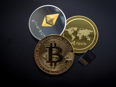 Bitcoin, Ethereum và Ripple là 3 loại tiền kỹ thuật số phổ biến nhất hiện nay. Ảnh: eCoin