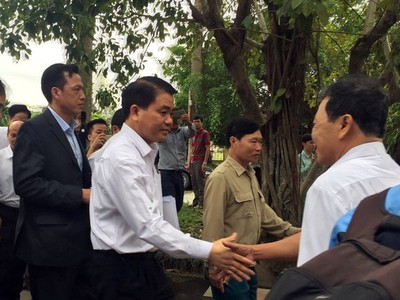 Ông Nguyễn Đức Chung - Chủ tịch UBND TP.Hà Nội trong lần về đối thoại với nhân dân xã Đồng Tâm (huyện Mỹ Đức).