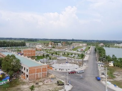 Một dự án đất nền và nhà phố tỉnh giáp ranh Sài Gòn. Ảnh: Vũ Lê.