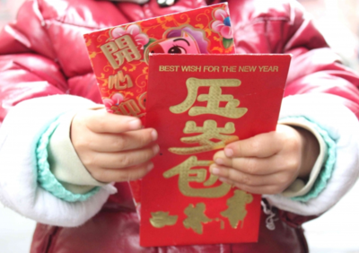 Trẻ con có thể họckỹ năng quản lý tài chính từ tiền lì xì.Ảnh: Rebecca Kanthor