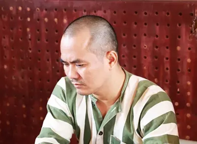 Lưu Văn Nguyện tại cơ quan công an. Ảnh: Thiện Nhân.