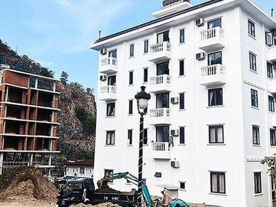 Những công trình của dự án Ocean View Nha Trang buộc phải cắt ngọn vì tự ý xây dựng vượt mức cho phép.