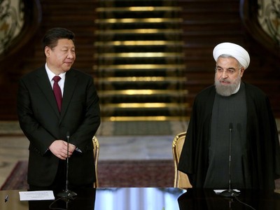 Chủ tịch Trung Quốc Tập Cận Bình và Tổng thống Iran Hassan Rouhani năm 2016. Ảnh: AP.