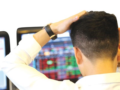 Tình trạng treo lệnh thường xảy ra khi thanh khoản của sàn HOSE chạm ngưỡng 14.000 tỷ đồng trong phiên. Ảnh: Dũng Minh.