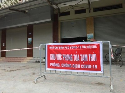 Huyện Đông Anh thực hiện cách ly F1 tại nhà. (Ảnh: Mạnh Khánh/TTXVN).