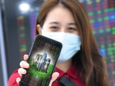 Cổ phiếu bất động sản vừa có đợt sóng tăng mới. Ảnh: Dũng Minh.