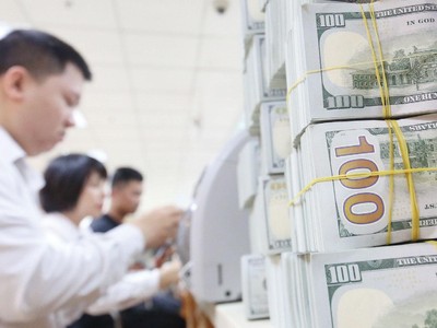 Áp lực tỷ giá sẽ dần hạ nhiệt khi nguồn cung ngoại tệ của Việt Nam đang có sự cải thiện đáng kể. Ảnh: Dũng Minh.