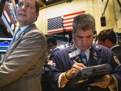 Phố Wall trái chiều sau phát biểu của Chủ tịch FED - Ảnh: Reuters