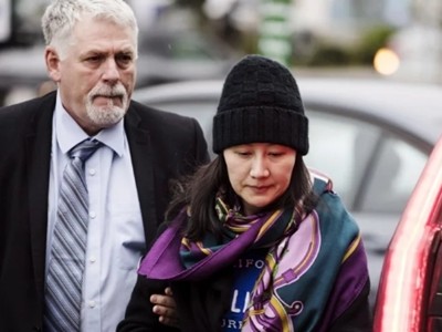 Mạnh Vãn Chu tại Vancouver ngày 12/12. Ảnh:AP.