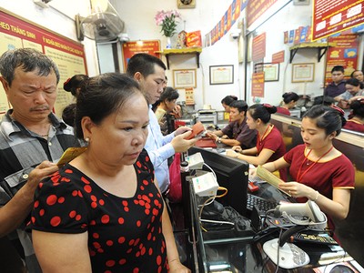 Sáng 7/7, vàng giảm xuống dưới 40 triệu đồng/lượng tỷ giá trung tâm tăng nhẹ