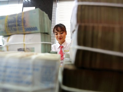 Nhiều ngân hàng dự báo sẽ vượt ít nhất 10-20% chỉ tiêu lợi nhuận năm nay. Ảnh: Dũng Minh