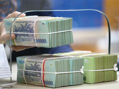 Tỷ lệ bao phủ nợ xấu tăng sẽ khiến lợi nhuận trước thuế của ngân hàng giảm. Ảnh: Dũng Minh 