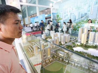 Nhiều người mua nhà để ở đang khó tiếp cận vốn ngân hàng. Ảnh: Dũng Minh