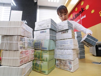 Biên lợi nhuận của các ngân hàng sẽ co hẹp hơn trong 2 quý cuối năm. Ảnh: Dũng Minh