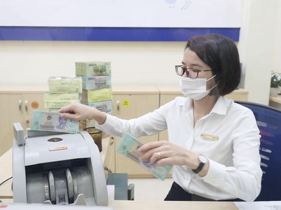 Quan ngại room tín dụng ít. Ảnh: Dũng Minh