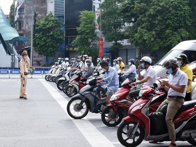 Việc bỏ bảo hiểm bắt buộc xe máy khó thực hiện trong một sớm, một chiều. Ảnh: Dũng Minh