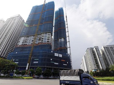 Việc gỡ vướng Luật Đất đai và các luật liên quan sẽ tạo nhiều thuận lợi cho thị trường bất động sản phát triển. Ảnh: Đức Thanh