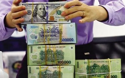 Lộ trình tăng lãi suất của Fed gây áp lực lên tỷ giá