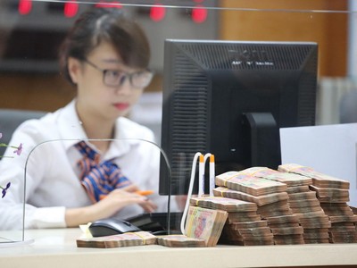 Rất ít ngân hàng đáp ứng được các tiêu chí để được cấp thêm room tín dụng. Ảnh: Dũng Minh 