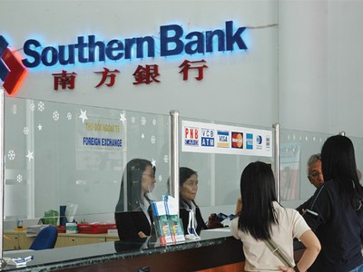 Nợ xấu vẫn đe dọa lợi nhuận ngân hàng năm 2014