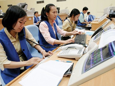 Bàn nhập lệnh tại sàn giao dịch của Trung tâm GDCK TP. HCM - Ảnh:Lê Toàn