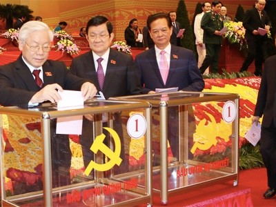 Tổng bí thư Nguyễn Phú Trọng và Chủ tịch nước Trương Tấn Sang là 2 người bỏ phiếu đầu tiên. (Ảnh: TTXVN)