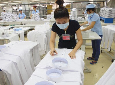 Dây chuyền sản xuất áo sơ mi xuất khẩu sang Mỹ. Ảnh: PV