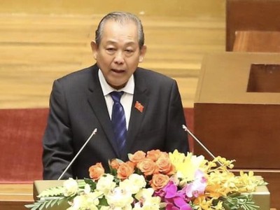 Phó Thủ tướng thường trực Trương Hòa Bình thay mặt Chính phủ trình bày báo cáo (Ảnh: VGP)