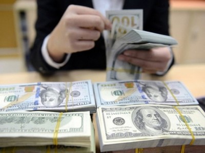 Fed giảm lãi suất, điều hành tỷ giá vẫn lo