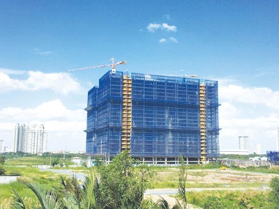 Để hoàn thành thủ thục xây dựng đối với 1 dự án nhà ở phải mất thời gian 2-3 năm, thậm chí lâu hơn. Ảnh: Trọng Tín