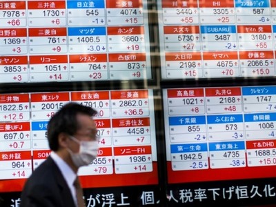 Chứng khoán Nhật Bản phiên sáng nay 18/3 giao dịch trong vùng tích cực với chỉ số Nikkei 225 tăng 1,48% còn Topix vọt lên 2,83%. Ảnh: AFP