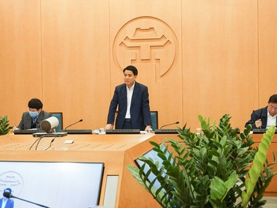 Chủ tịch UBND TP. Hà Nội Nguyễn Đức Chung tại phiên họp trực tuyến với các quận huyện, xã phường sáng 13/4.