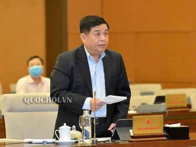 Bộ trưởng Bộ Kế hoạch và Đầu tư Nguyễn Chí Dũng báo cáo Dự thảo Nghị quyết về cơ chế đặc thù về tài chính và chính quyền đô thị của Đà Nẵng