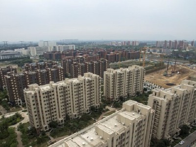 Doanh số bất động sản tính theo mét sàn tại Trung Quốc tăng 9,7% trong tháng 5. Ảnh: AFP