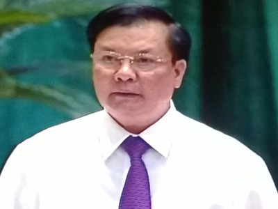 Bộ trưởng Bộ Tài chính Đinh Tiến Dũng trả lời chất vấn tại Quốc hội chiều 10/6 (Ảnh chụp qua màn hình)