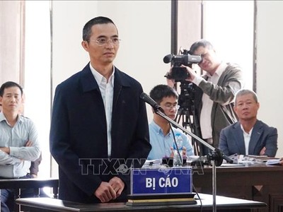 Bị cáo Đặng Anh Tuấn tại tòa sơ thẩm sáng 25/11/2019. Ảnh: TTXVN