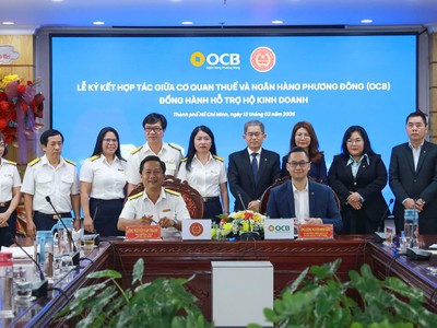 Đại diện Lãnh đạo OCB và Thuế TP. HCM thực hiện ký kết tại buổi lễ