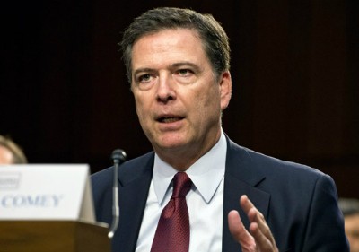 Giám đốc FBI James Comey. Ảnh: Francis Rivera