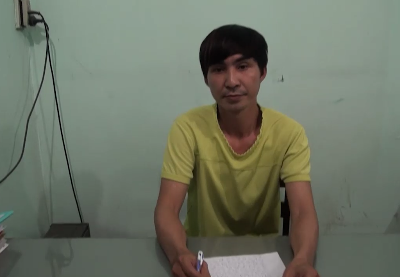 Đối tượng Nguyễn Xuân Long tại cơ quan điều tra - Ảnh cắt từ Clip