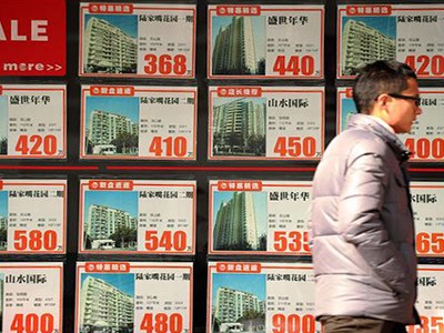 Các quảng cáo nhà đất "sinh lợi cao" và liên quan đến mê tín sẽ bị cấm tại Bắc Kinh. Ảnh:AFP