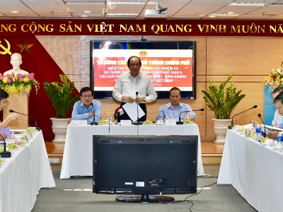 Bộ trưởng, Chủ nhiệm Văn phòng Chính phủ, Tổ trưởng Tổ công tác của Chính phủ làm việc với Tập đoàn Dệt may (Vinatex) ngày 20/6. Ảnh: Nhật Bắc