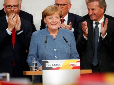 Thủ tướng Đức Angela Merkel phát biểu mừng chiến thắng với nhiệm kỳ thứ 4. Ảnh: Reuters.