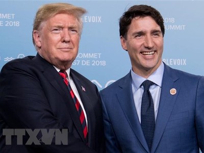 Thủ tướng Canada Justin Trudeau (phải) và Tổng thống Mỹ Donald Trump tại cuộc gặp ở Quebec (Canada) ngày 8/6. (Ảnh: AFP/TTXVN).