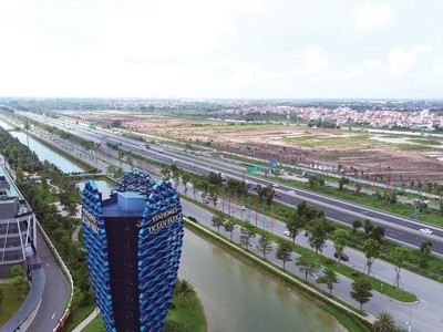 Phát triển dự án bất động sản luôn cần nguồn vốn lớn. Ảnh: Dũng Minh.