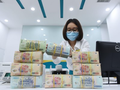 Nếu tính cả các khoản nợ được cơ cấu, nợ xấu ngân hàng đã lên tới 7,21% 