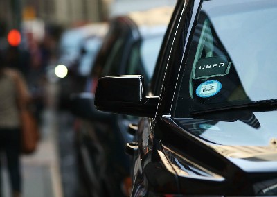 Uber vẫn chưa thoát khó khăn tài chính. Ảnh: Bloomberg