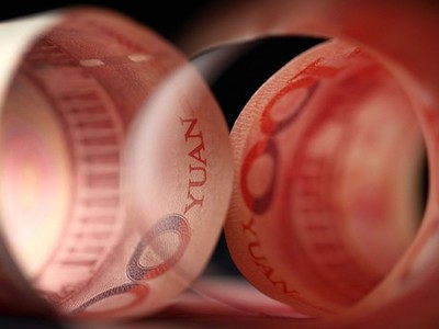 Đồng 100 NDT của Trung Quốc. Ảnh: Bloomberg