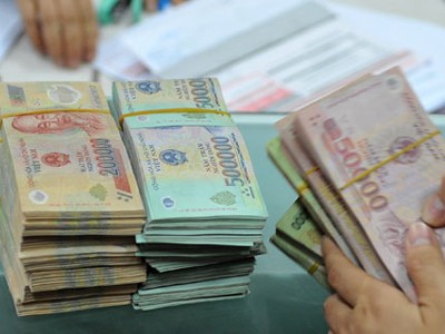 Chính phủ đề xuất chế độ tiền lương mới cho khu vực công sẽ được thực hiện từ năm 2021. Ảnh: PV