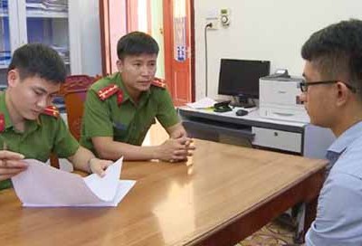 Nghi can làm việc tại cơ quan điều tra. Ảnh: S.H.